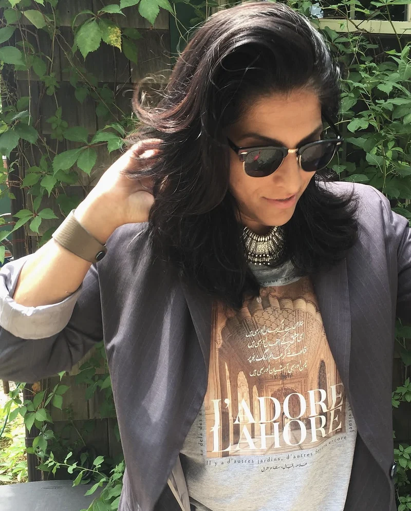 A customer wearing the J'adore Lahore tee